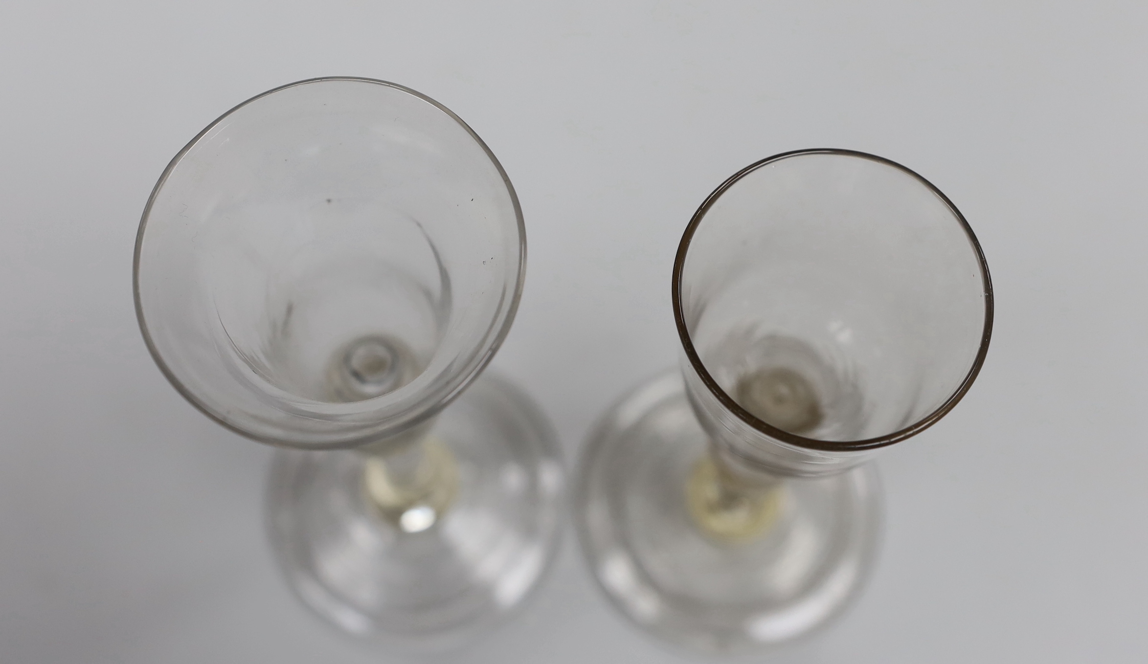 Two George II wine glasses, each with folded foot, tallest 15.5cm